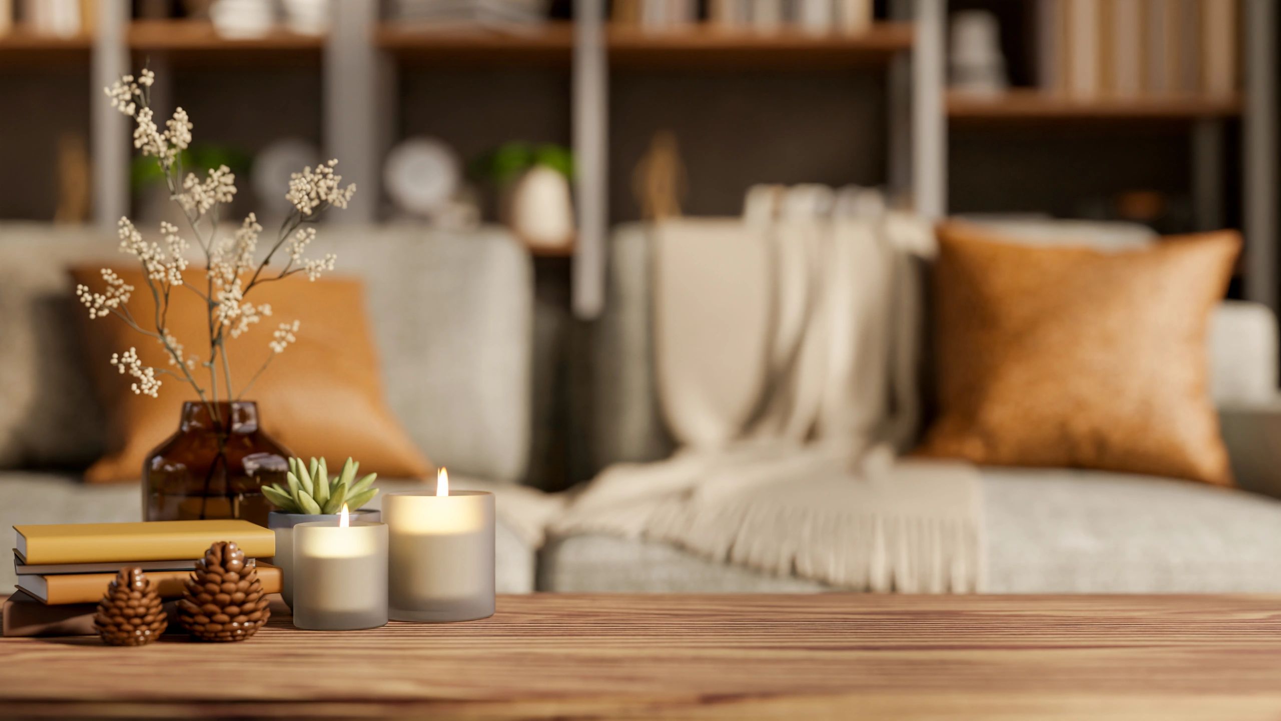 Styled home detail with candles and decor on a wooden table