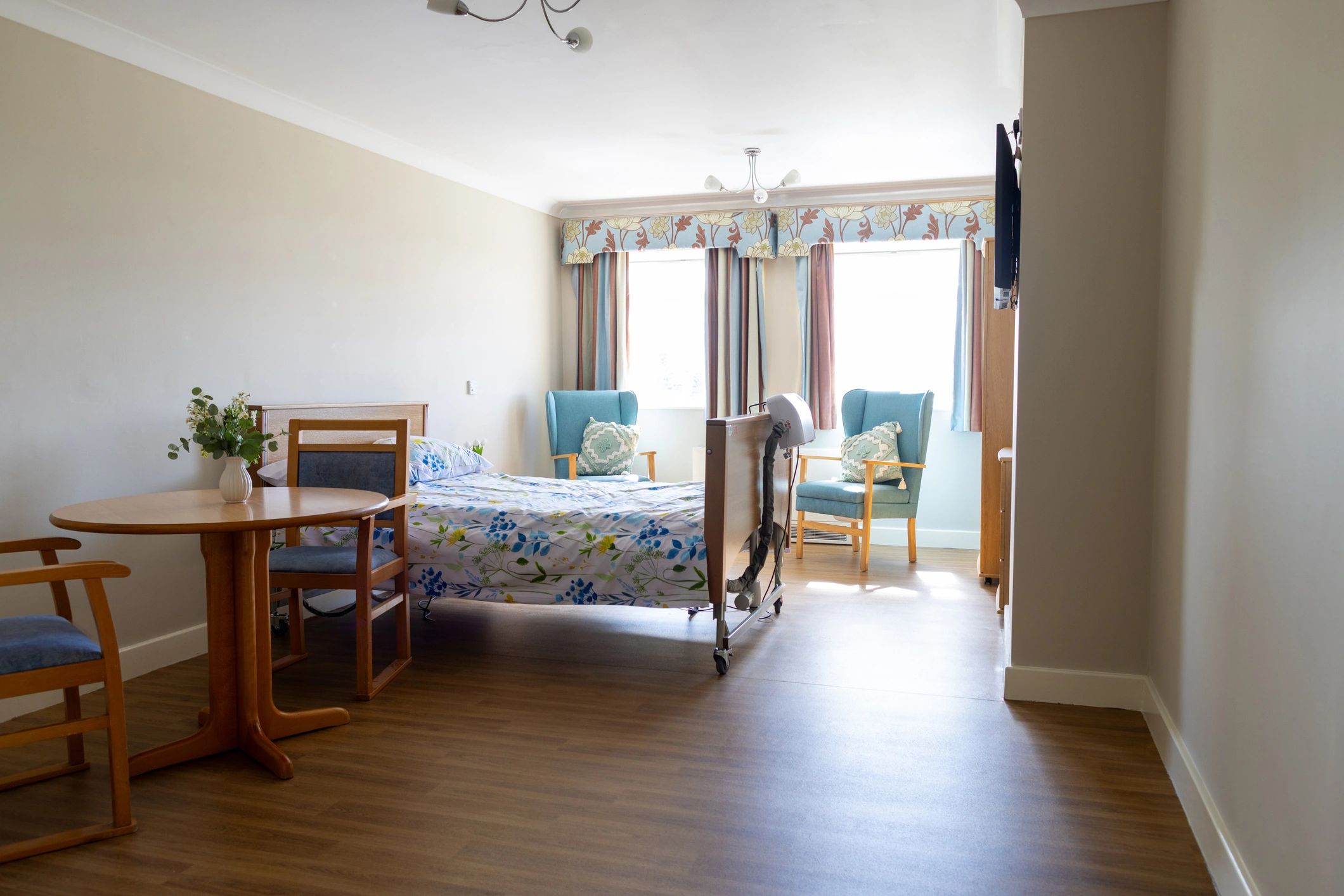 Bright bedroom interior with seating area
